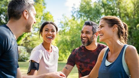 Group of active mature friends in park