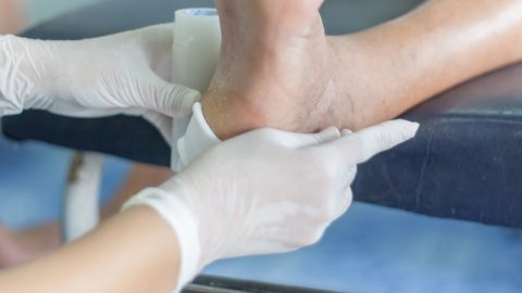 Doctor examining patient's foot